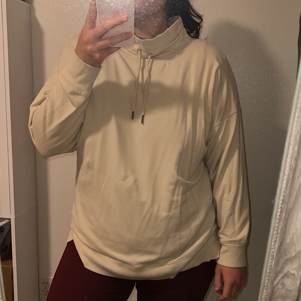 Cream colored workout sweater